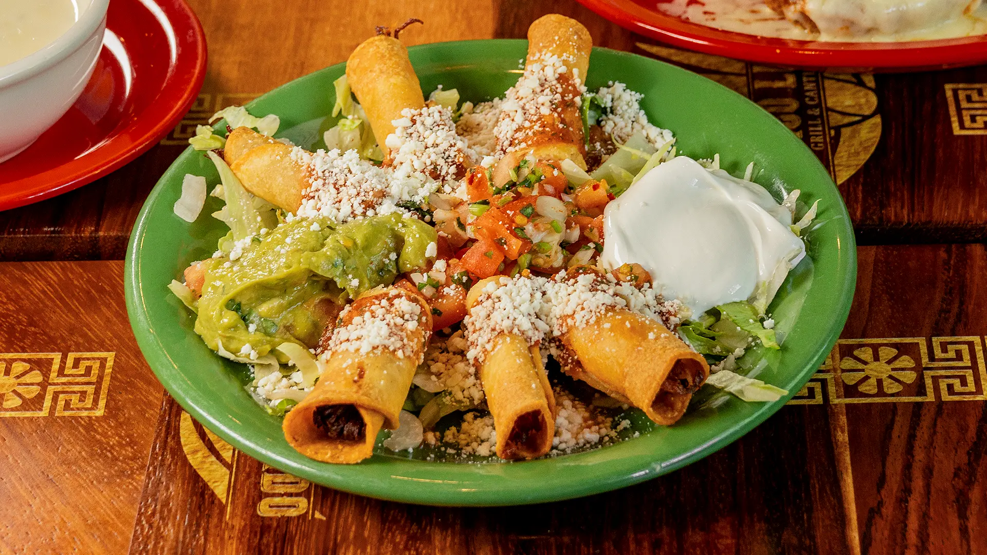 Flautas with guacamole, pico de gallo and crema